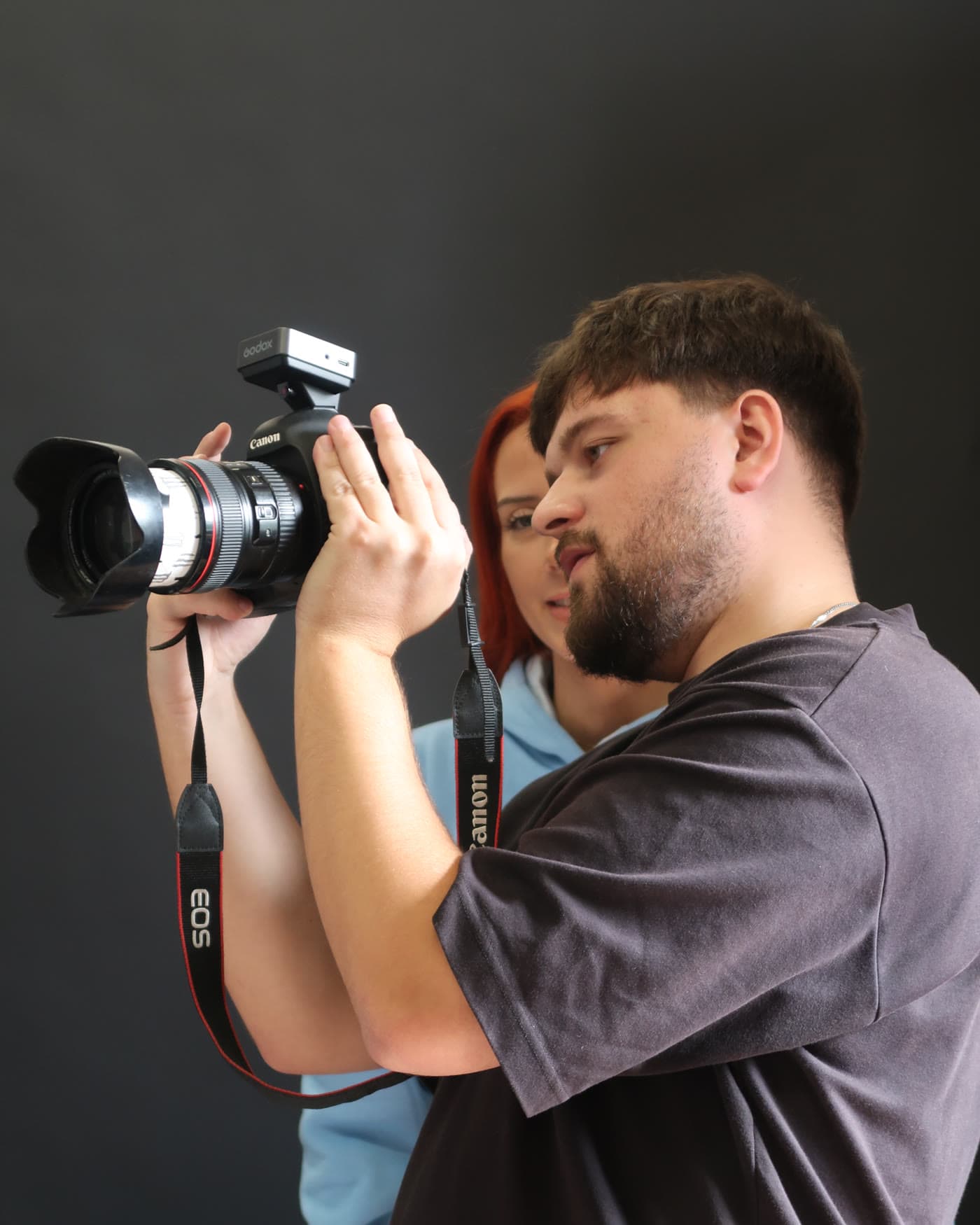 Behind the scenes, a frame being taken on set