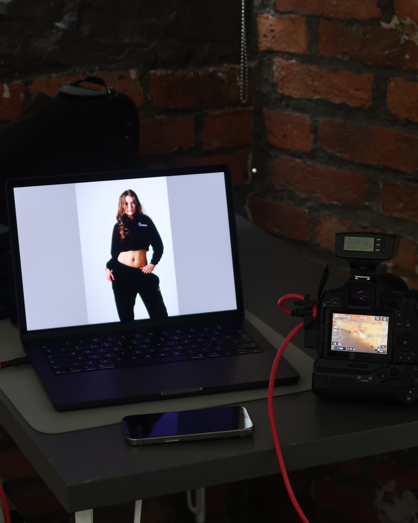 Behind the scenes, shots reviewed on the tethered laptop